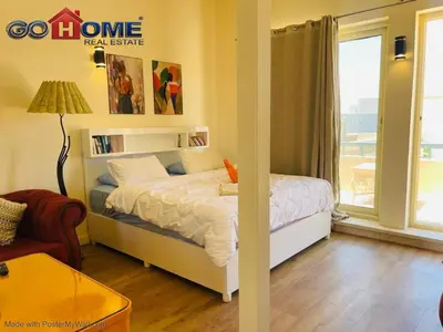 a bedroom with a bed and a window at Studio In Marina El Gouna in Hurghada