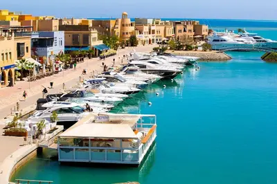a group of boats are docked in a harbor at Studio In Marina El Gouna in Hurghada