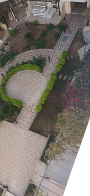 an overhead view of a garden with flowers and plants at Florenza Khamsin Hurghada in Hurghada