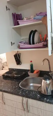 a kitchen counter top with a sink and a counter top at Florenza Khamsin Hurghada in Hurghada