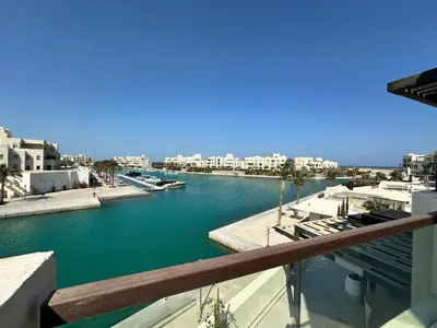 a view of a river in a city with buildings at Fanadir Marina Vista in Hurghada