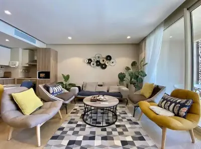a living room with a couch and chairs and a table at Stylish Gouna Mangroovy Retreat in Hurghada