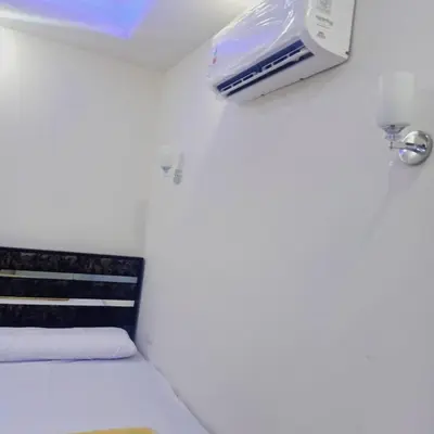 a room with a bed and a air conditioner on the wall at Selena bay resort in Hurghada