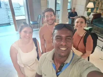 a group of people posing for a picture at Cataract Nile View Rooms in Shellal