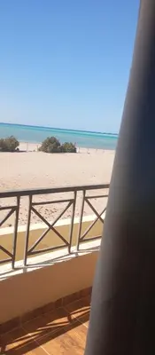 a view of the beach from a balcony at Casablanca Resort A F in Hurghada
