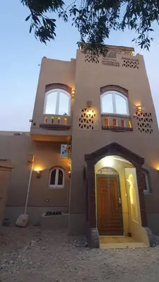 a building with a door in front of it at House Mountain Luxor - Villa for rent in Luxor