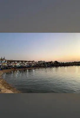a body of water with a city in the background at Adler-Hurghada Holiday apartment sea view rooftop pool 80m to beach in Hurghada