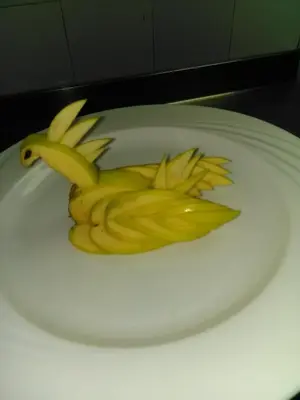 a pile of sliced bananas on a white plate at Lucky in Luxor