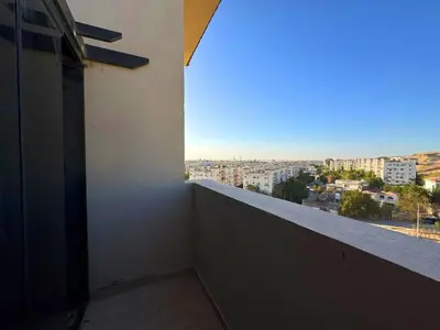 a balcony with a view of a city at ALDAU LaLa in Hurghada