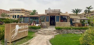 a house in the middle of a yard at vintage sea view apartment in Hurghada
