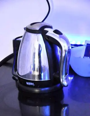 a tea kettle sitting on top of a table at Boho Oasis - Studio Hurghada Red Sea in Hurghada
