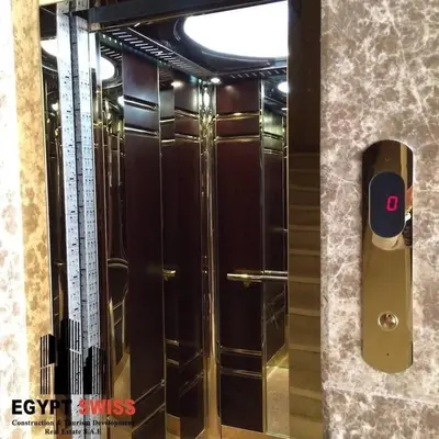 a elevator in a building with a glass door at Boho Oasis - Studio Hurghada Red Sea in Hurghada