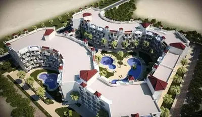 an overhead view of a large building with a swimming pool at tiba A F B view in Hurghada