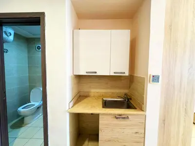 a small bathroom with a sink and a toilet at Apartment Aldau in Hurghada