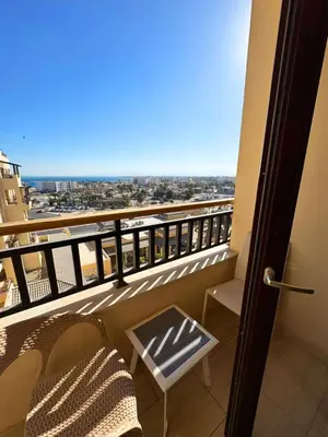 a balcony with a view of a city at Apartment Aldau in Hurghada