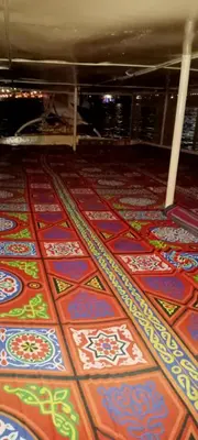a floor with colorful tiles on the floor at Sunset and Sand Felucca Life on the Nile in Jazīrat Aswān