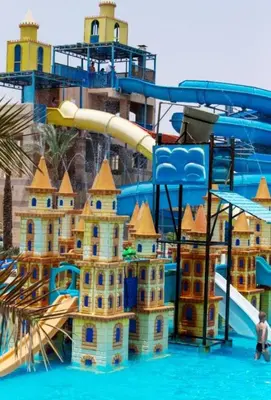 a castle on a water slide at a water park at Minaland Beach Resort & Aquapark in Hurghada