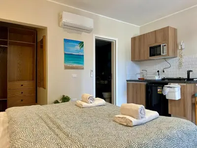 a bedroom with a bed with towels on it at Bali Gouna 1 bed - heated pool in Hurghada