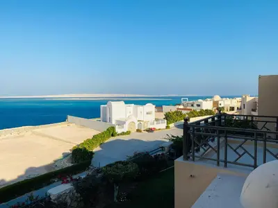 an aerial view of a resort with the ocean at Palm View Paradise-Downtown Hurghada in Hurghada