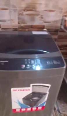 a toaster with a cell phone on top of it at elqusier redsea in Quseir