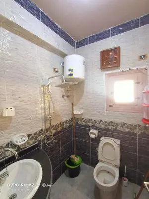 a bathroom with a toilet and a sink at elqusier redsea in Quseir