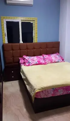 a bedroom with a large bed in a room at الغردقة in Hurghada