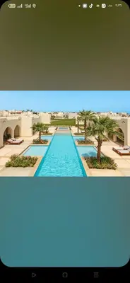a view of a swimming pool in a resort at شقه فردين مطله علي حمام السباحه في الغردقه in Hurghada
