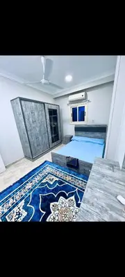 a living room with a rug on the floor at Apartment in hurghada at hadba St in Hurghada