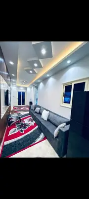 a living room with a couch and a rug at Apartment in hurghada at hadba St in Hurghada