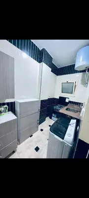a kitchen with a stove and a sink in it at Apartment in hurghada at hadba St in Hurghada
