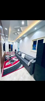 a living room with a couch and a rug at Apartment in hurghada at hadba St in Hurghada
