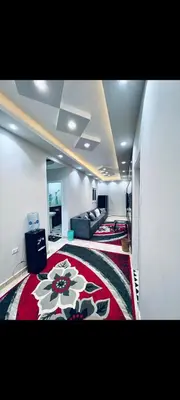 a living room with a couch and a rug at Apartment in hurghada at hadba St in Hurghada