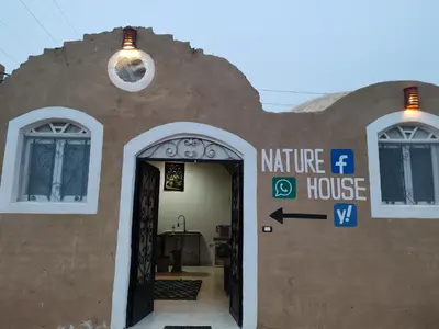 a building with an entrance to a house at Nature House in Luxor