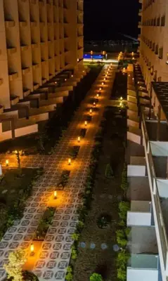 a view of a city street at night with lights at Hurghada Scandic in Hurghada