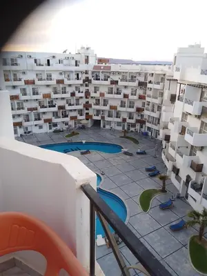 a view from the balcony of a apartment building at Studio on the roof in Hurghada