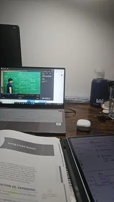 a laptop computer sitting on top of a desk at Angel in Hurghada