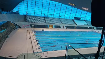 a large swimming pool in a large building at Angel in Hurghada