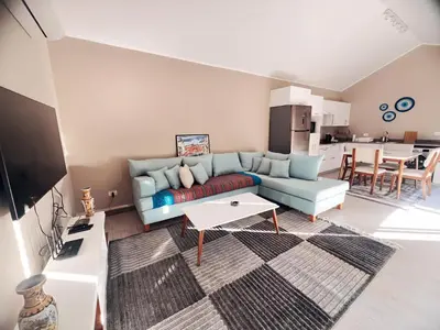 a living room with a couch and a table at Bali A 22 in Hurghada