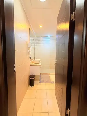 a bathroom with a toilet and a sink at Hotel Apartment 1 very nice and quiet hurghada in Hurghada