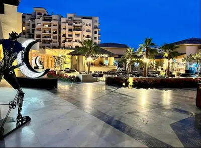 a statue of a woman standing in front of a building at Hotel Apartment 1 very nice and quiet hurghada in Hurghada