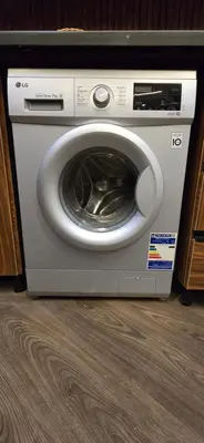 a washing machine is sitting on a floor at Dive Hostel Hurghada Sea Light in Hurghada
