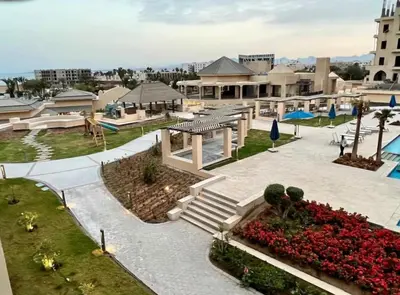a view of a building with a park at Modern apartment in Hurghada al dau heights 3314 in Hurghada