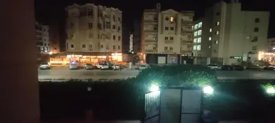 a view of a parking lot at night at Apartment for rent in Hurghada