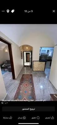 a view of a living room with a rug at Palace view in Hurghada