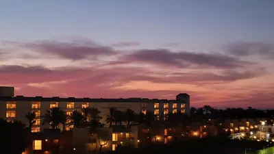 a view of a building at night with the sky at touristic centre hurghada in Hurghada