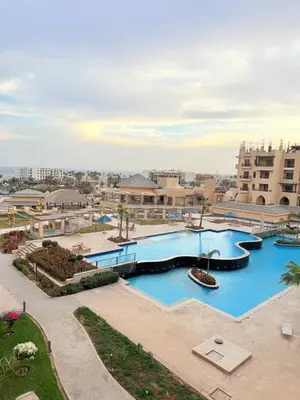 an image of a pool at a resort at Studio in Dow Heights Compound in Hurghada