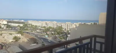 a view of a city with a street and buildings at the flower of the sea in Hurghada