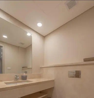 a bathroom with a sink and a mirror at Mangroovy- 1br GF Waterfront Glitzy direct pool in Hurghada