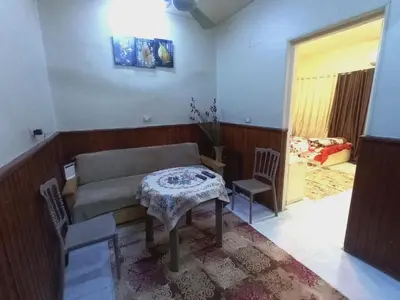 a living room with a couch and a table at Aswan cozy apartment in Aswan