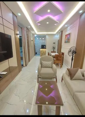 a living room with a couch and a table at شقه للايجار اليومى او الشهرىApartment for daily or monthly rent in Hurghada